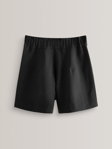 Next - Loosefit Pantalón en negro