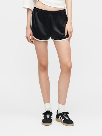 ADIDAS ORIGINALS Normalny krój Spodnie 'SPRNTR' w kolorze czarny: przód