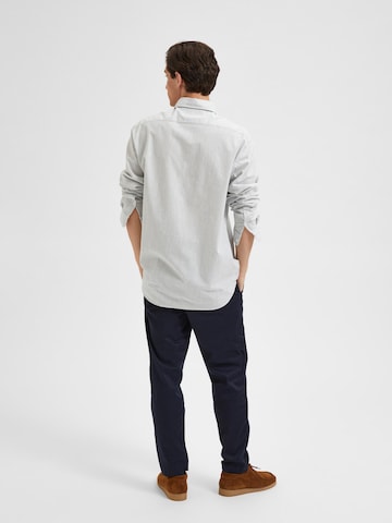 SELECTED HOMME جينز مضبوط قميص 'REGNICK' بلون أزرق