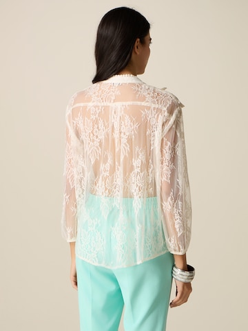 Camicia da donna di oltre in bianco