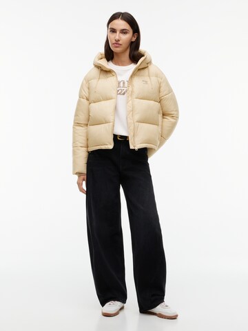 Tommy Jeans Zimní bunda – béžová
