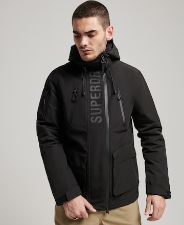 Veste fonctionnelle 'Ultimate' Superdry en noir : devant