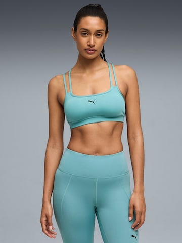 Top sportivo 'Puma Move Strappy Bra' di PUMA in blu