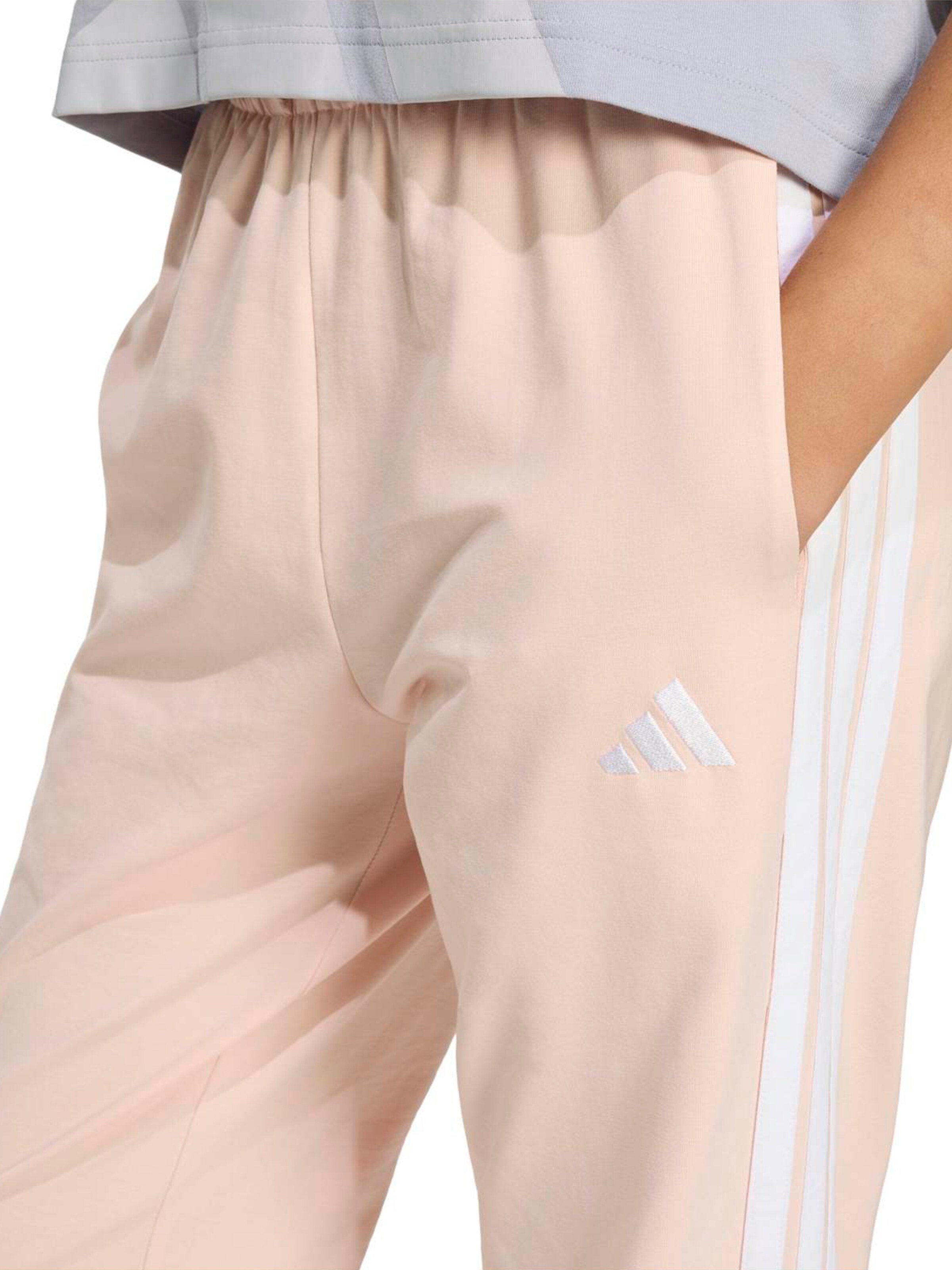 ADIDAS SPORTSWEAR Zwężany krój Spodnie sportowe 'Essentials' w kolorze różowy