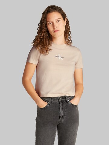 T-shirt Calvin Klein Jeans en beige : devant