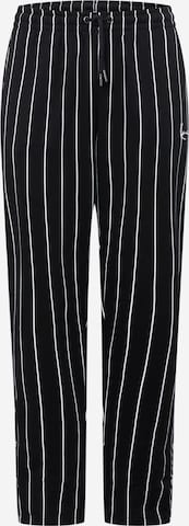 Karl Kani Loose fit Pants in Black: front