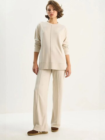 Bianco Lucci - Roupa de casa em bege