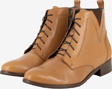 Usha Lace-Up Ankle Boots in Brown