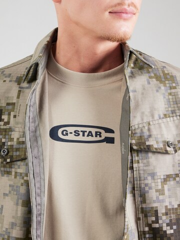 G-STAR Koszulka 'Old skool' w kolorze beżowy