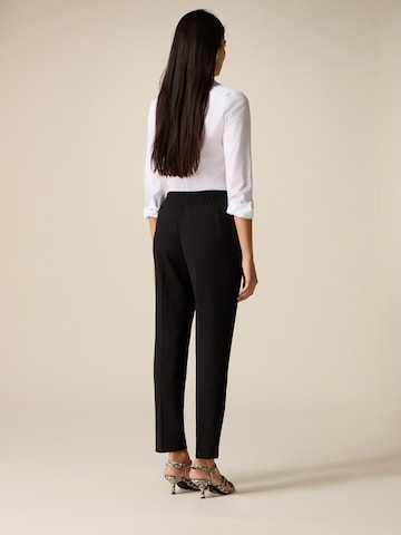 regular Pantaloni di oltre in nero