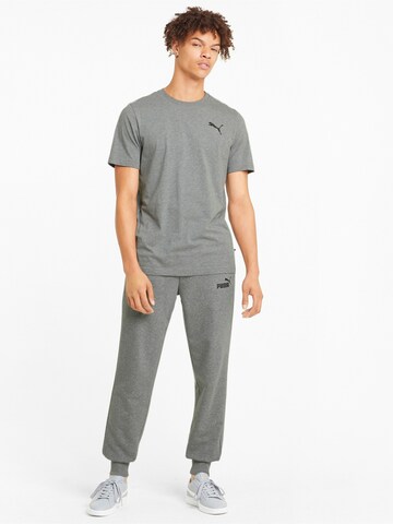 Effilé Pantalon de sport PUMA en gris