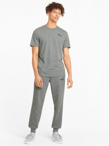 PUMA - Tapered Pantalón deportivo en gris