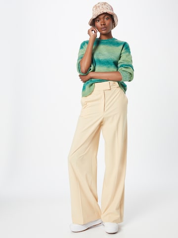 IVY OAK Wide leg Pleated Pants 'PEONY ROSE' in Yellow