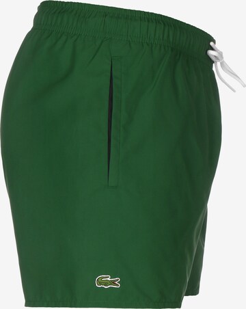 LACOSTE - Bermudas en verde