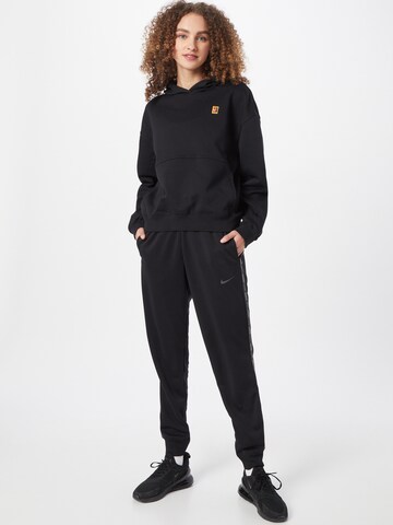 NIKE Sport sweatshirt i svart