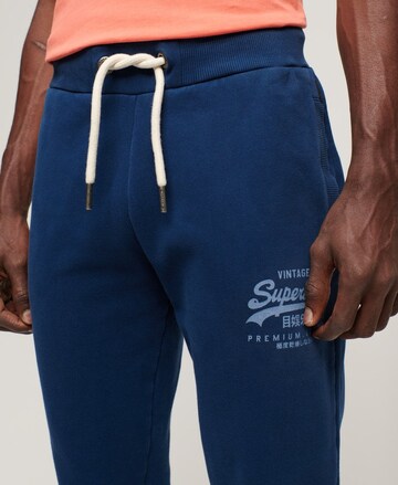 Superdry Tapered Broek in Blauw