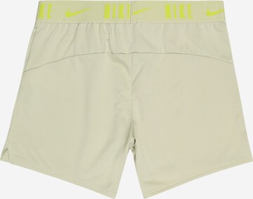 NIKE Skinny Workout Pants 'Trophy' in Green