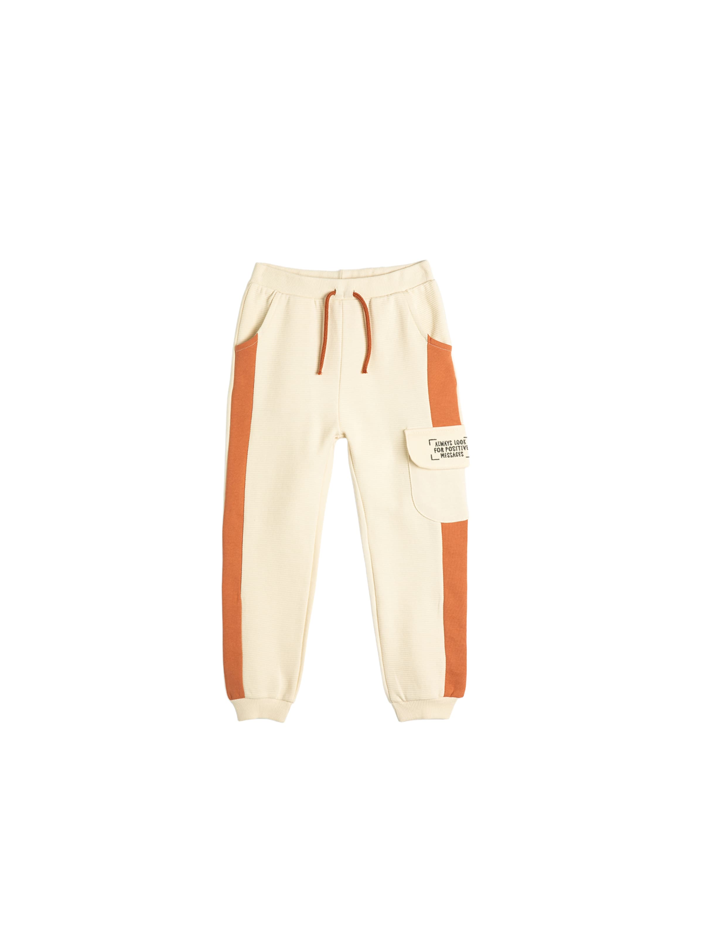 Koton Loose fit Trousers in Beige: front