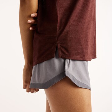new balance Functioneel shirt 'Athletics T-Shirt' in Bruin