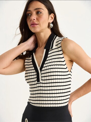 Top in maglia di Bianco Lucci in bianco