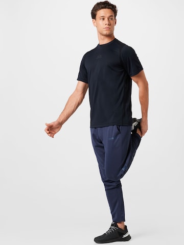 Hummel Zúžený Sportovní kalhoty 'Legacy Poly' – modrá