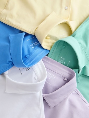 T-Shirt Next en mélange de couleurs