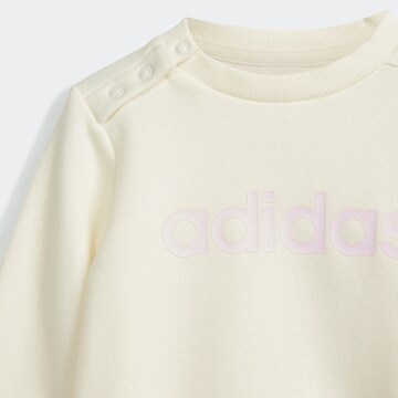 ADIDAS SPORTSWEAR Sweatsuit 'Essentials Lineage' in Pink