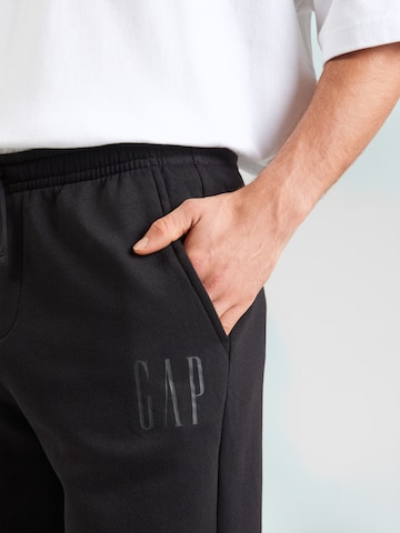 melns GAP Pakapēniski sašaurināts piegriezums Bikses