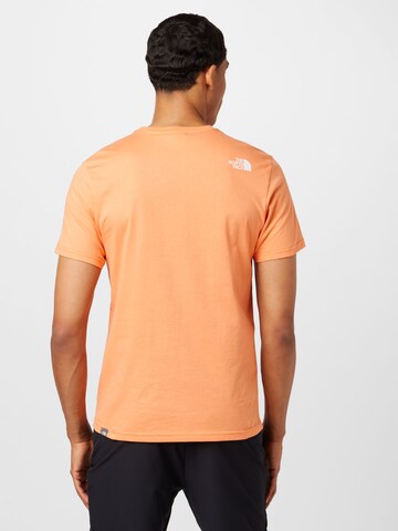 THE NORTH FACE Regular fit Μπλουζάκι 'Simple Dome' σε πορτοκαλί