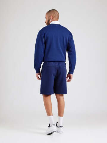 regular Pantaloni di Champion Authentic Athletic Apparel in blu
