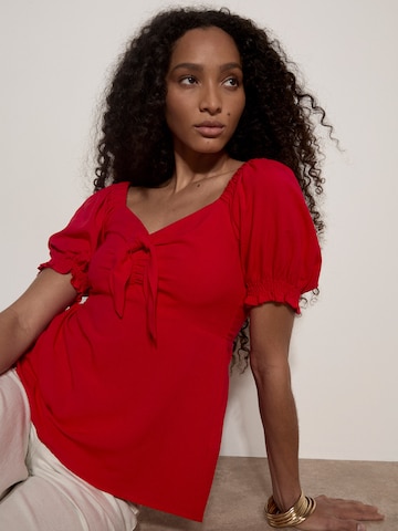 Chemisier ' ' Apricot en rouge
