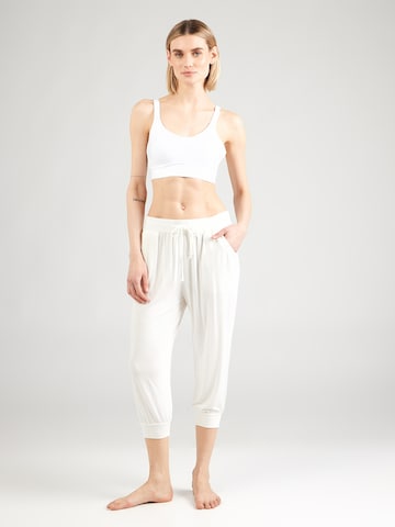 CURARE Yogawear - Tapered Calças de desporto em branco