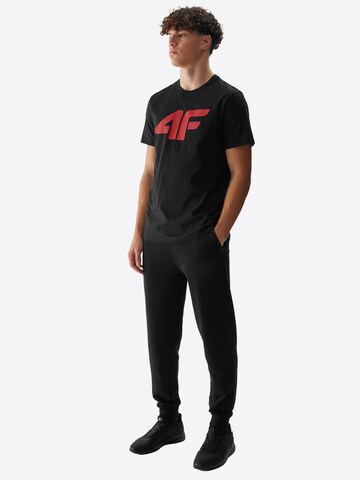 Effilé Pantalon de sport 4F en noir