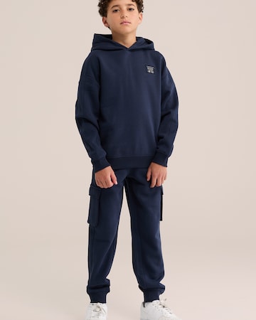 WE Fashion Tapered Trousers in Blue: front