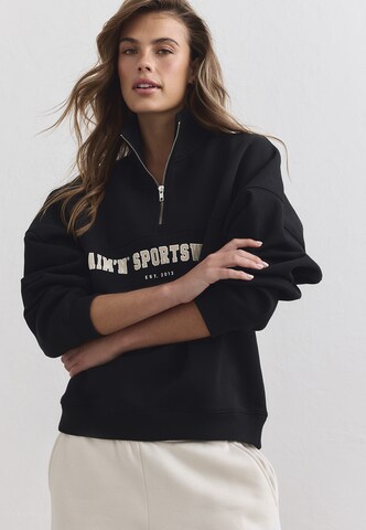 Felpa sportiva 'Varsity' di Aim'n in nero: frontale