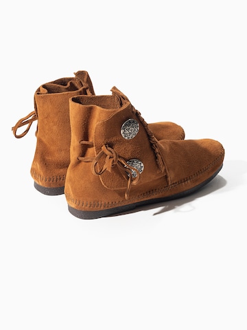 Minnetonka Kozaki w kolorze brązowy