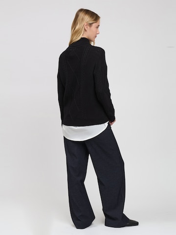 Influencer - Jersey en negro