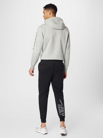 Nike Sportswear Tapered Pants in Black