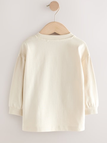 T-Shirt Next en blanc
