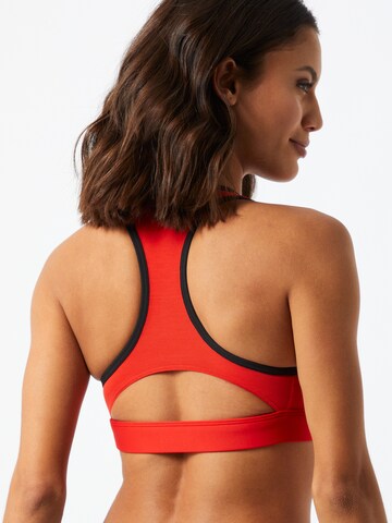 Reebok Bustier Športni nederček | rdeča barva