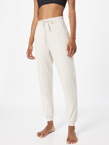 NIKE - Tapered Pantalón deportivo en blanco: frente