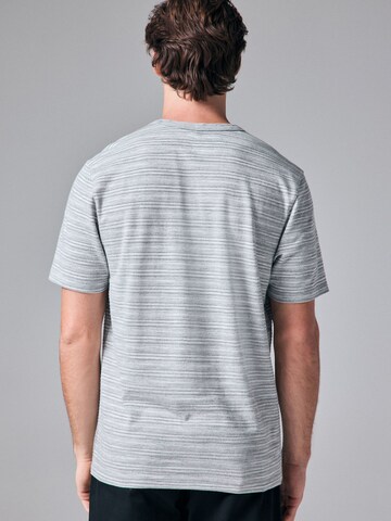 T-Shirt Next en gris