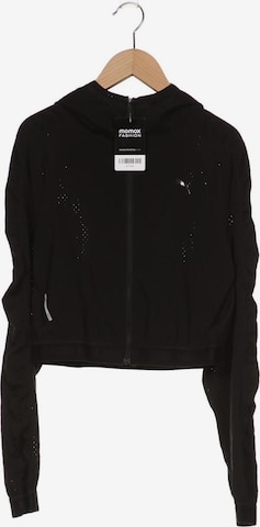 PUMA Sweatshirt & Zip-Up Hoodie in XS in Black: front