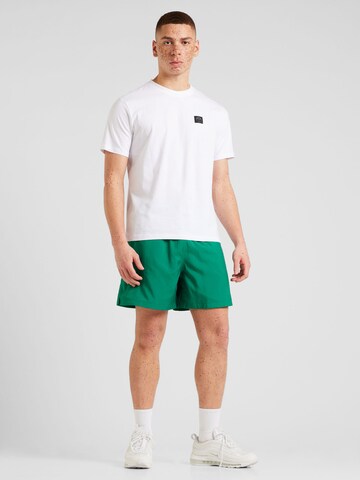 Nike SportswearLoosefit Hlače 'CLUB' - zelena boja