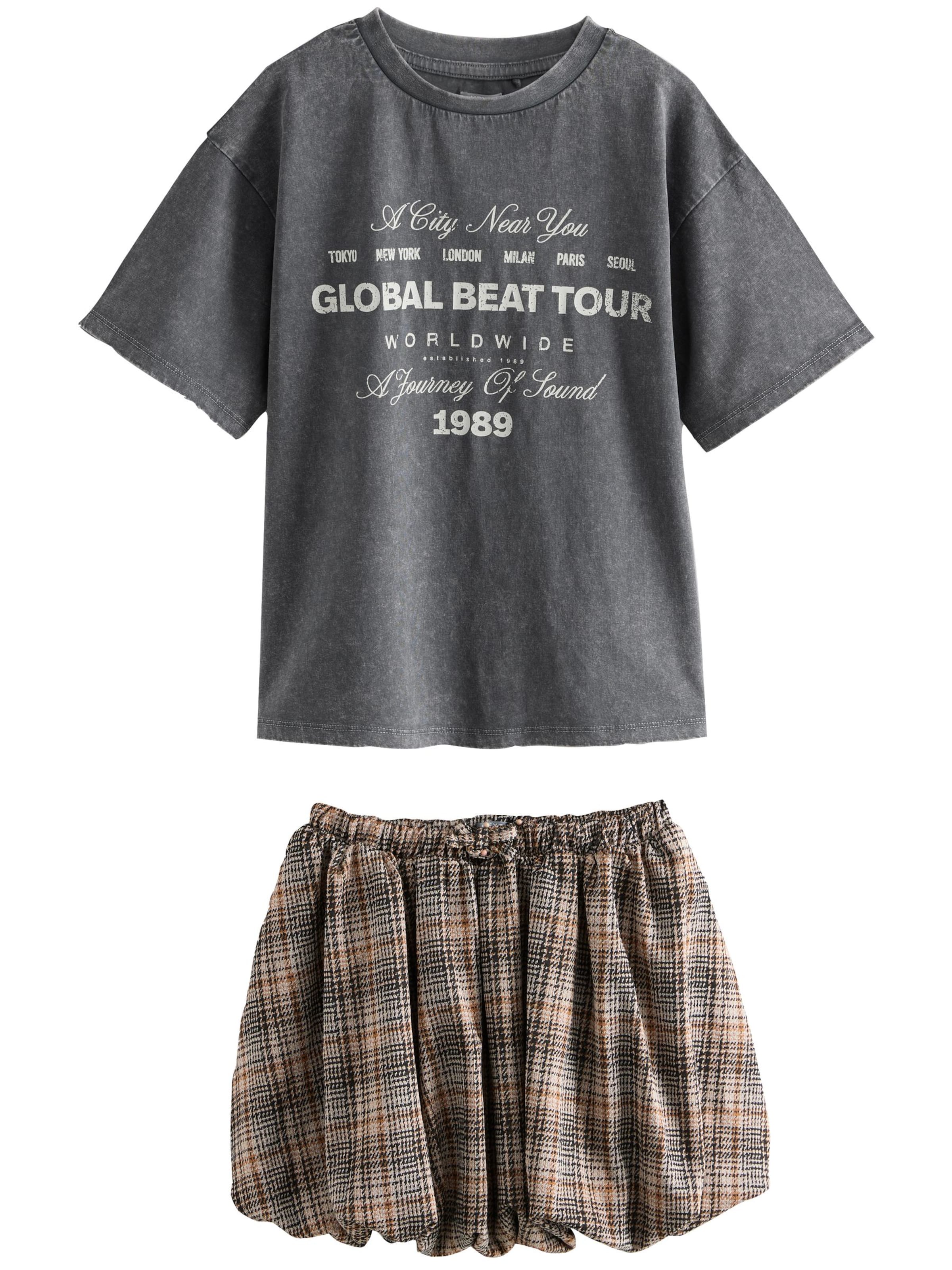 Next Set i grå: framsida