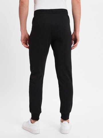 Coupe slim Pantalon Champion Authentic Athletic Apparel en noir