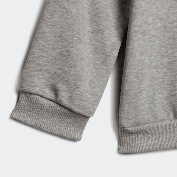 ADIDAS SPORTSWEAR Skinny Tracksuit 'Badge Of Sport French Terry' in Grey