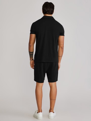 Completo sportivo di SikSilk in nero