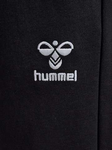 Effilé Pantalon de sport 'Go 2.0' Hummel en noir