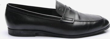 Tod's Flats & Loafers in 42 in Black: front